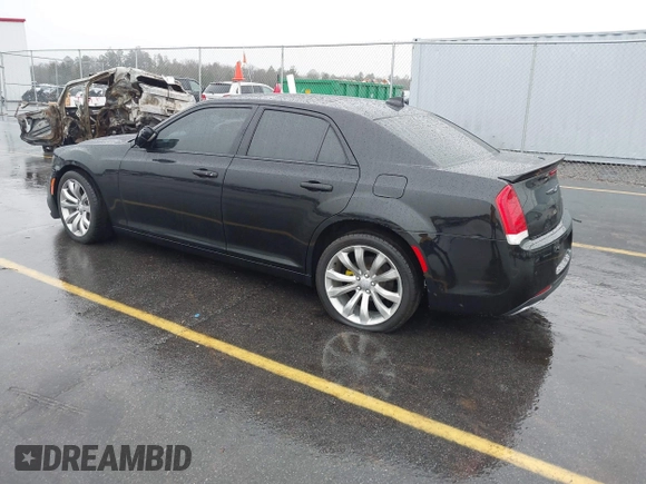 2015 Chrysler 300 C with VIN 2C3CCAEG8FH786879, listed as a IAAI auction lot 41563321 with 130,060 mi miles and . Bid and sale history available at carsss.com. Image 3.