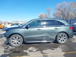 2016 Acura MDX w/Advance with VIN 5FRYD4H9XGB009333, listed as a IAAI auction lot 41799106 with 143,192 mi miles. Bid and sale history available at carsss.com. Image 15.
