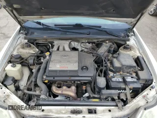 2002 Toyota Avalon XL with VIN 4T1BF28B42U250096, listed as a Copart auction lot 51817975 with 154,305 mi miles and Salvage Title. Bid and sale history available at DreamBid. Image 11.