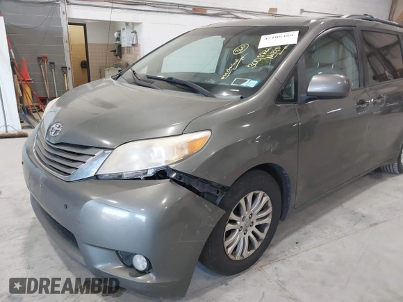 2011 Toyota Sienna XLE AAS with VIN 5TDYK3DC8BS111639, listed as a IAAI auction lot 42108488 with 300,872 mi miles and . Bid and sale history available at DreamBid. Image 17.