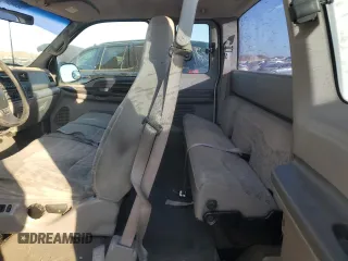 1999 Ford F-250 XL with VIN 1FTNX21L5XEE86694, listed as a Copart auction lot 41697885 with 153,948 mi miles and Salvage title. Bid and sale history available at DreamBid. Image 10.