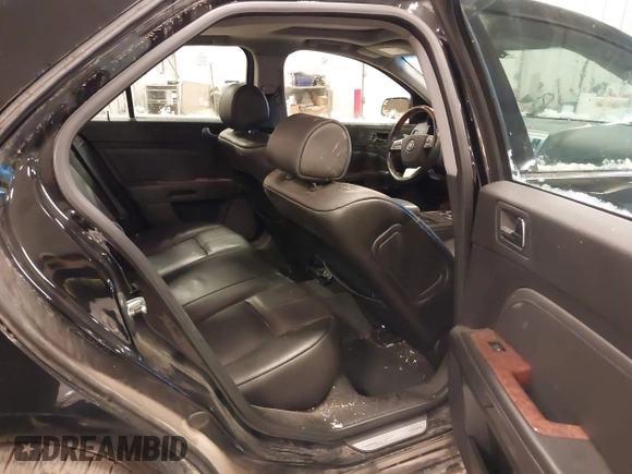 2010 Cadillac STS AWD with VIN 1G6DU6EV2A0125065, listed as a IAAI auction lot 41229886 with 84,954 mi miles and . Bid and sale history available at DreamBid. Image 8.