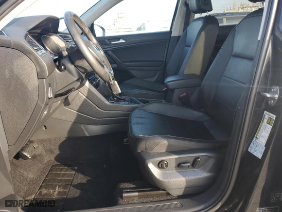 2021 Volkswagen Tiguan SE with VIN 3VV3B7AXXMM085722, listed as a Copart auction lot 54438285 with 76,746 mi miles and Clean Title. Bid and sale history available at carsss.com. Image 7.