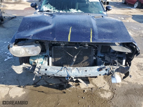 2013 Dodge Challenger SXT with VIN 2C3CDYAG3DH723827, listed as a Copart auction lot 87917765 with 125,062 mi miles and Salvage Title. Bid and sale history available at carsss.com. Image 12.