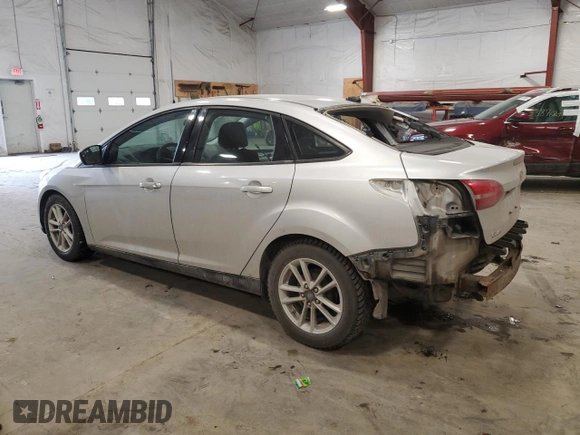 2018 Ford Focus SE z VIN 1FADP3F24JL315154, wystawiony jako Copart lot #53609185 z przebiegiem 76 216 mil mil oraz Szkoda całkowita • Salvage title. Historia ofert i sprzedaży dostępna na DreamBid. Obrazek 2.