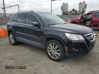 2011 Volkswagen Tiguan SE with VIN WVGBV7AX3BW551114, listed as a Copart auction lot 56016925 with 122,259 mi miles and Clean Title. Bid and sale history available at DreamBid. Image 4.