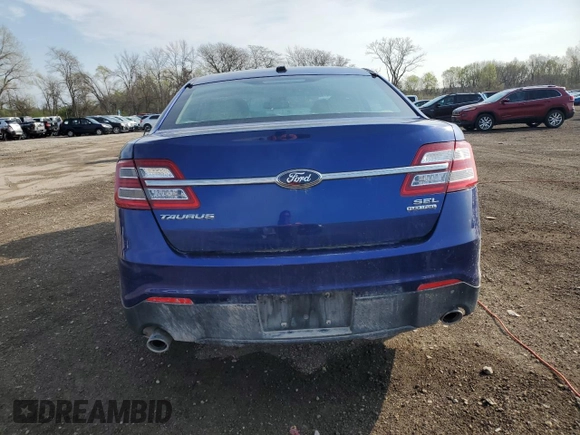 2014 Ford Taurus SEL z VIN 1FAHP2E88EG174797, wystawiony jako Copart lot #53961615 z przebiegiem Nie podano mil oraz Szkody całkowita. Historia ofert i sprzedaży dostępna na DreamBid. Obrazek 6.