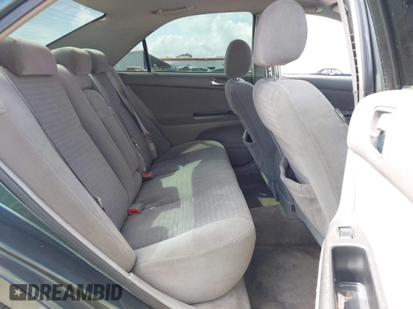 2005 Toyota Camry LE z VIN 4T1BE30K25U398675, wystawiony jako IAAI lot #41923096 z przebiegiem 174 453 mil mil oraz . Historia ofert i sprzedaży dostępna na DreamBid. Obrazek 8.