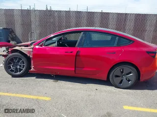 2021 Tesla Model 3 Long Range with VIN 5YJ3E1EBXMF928002, listed as a IAAI auction lot 42003092 with 25,867 mi miles. Bid and sale history available at carsss.com. Image 12.