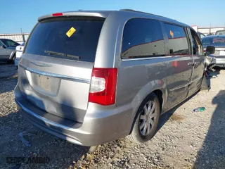 2014 Chrysler Town & Country Touring with VIN 2C4RC1BG4ER158739, listed as a IAAI auction lot 40970547 with 179,456 mi miles. Bid and sale history available at carsss.com. Image 4.