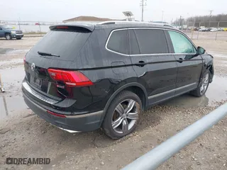 2019 Volkswagen Tiguan SEL Premium with VIN 3VV4B7AXXKM053709, listed as a IAAI auction lot 40840656 with 60,970 mi miles. Bid and sale history available at carsss.com. Image 4.