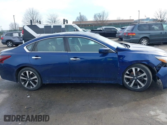 2018 Nissan Altima 2.5 SR with VIN 1N4AL3AP3JC101421, listed as a IAAI auction lot 41482620 with 101,431 mi miles. Bid and sale history available at carsss.com. Image 13.