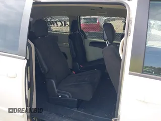 2012 Dodge Grand Caravan SXT with VIN 2C4RDGCGXCR358794, listed as a IAAI auction lot 42007316 with 212,518 mi miles and . Bid and sale history available at DreamBid. Image 8.