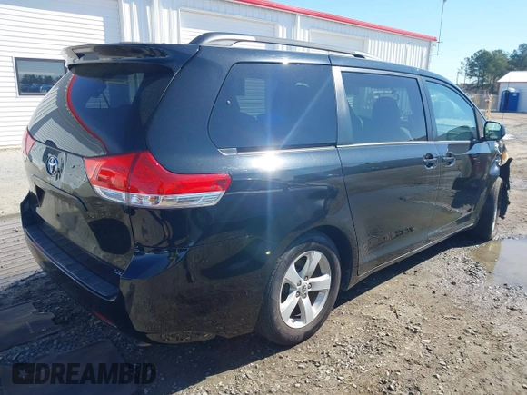 2012 Toyota Sienna LE AAS with VIN 5TDKK3DC3CS263240, listed as a IAAI auction lot 41810686 with 232,026 mi miles. Bid and sale history available at carsss.com. Image 4.