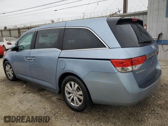 2014 Honda Odyssey EX-L with VIN 5FNRL5H68EB103941, listed as a Copart auction lot 60715095 with 109,013 mi miles and Salvage title. Bid and sale history available at DreamBid. Image 2.