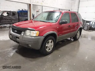 2001 Ford Escape XLT with VIN 1FMYU04121KA37255, listed as a IAAI auction lot 41526550 with 262,158 mi miles. Bid and sale history available at carsss.com. Image 2.