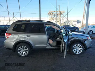 2011 Subaru Forester X Limited with VIN JF2SHAEC5BH757458, listed as a IAAI auction lot 41059097 with 133,662 mi miles and . Bid and sale history available at DreamBid. Image 13.