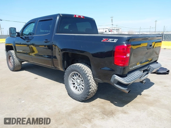 2015 Chevrolet Silverado 1500 LT with VIN 3GCUKRECXFG370962, listed as a IAAI auction lot 42141566 with 92,292 mi miles and . Bid and sale history available at DreamBid. Image 3.
