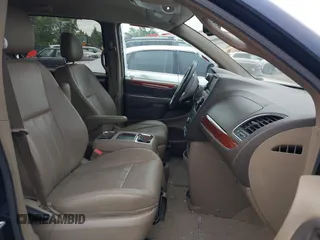 2013 Chrysler Town & Country Touring z VIN 2C4RC1BG1DR677083, wystawiony jako IAAI lot #42317204 z przebiegiem 204 879 mil mil oraz . Historia ofert i sprzedaży dostępna na DreamBid. Obrazek 5.