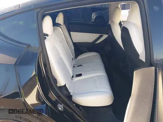 2022 Tesla Model Y Performance with VIN 7SAYGDEF0NF447541, listed as a IAAI auction lot 41762592 with 41,204 mi miles and . Bid and sale history available at DreamBid. Image 8.