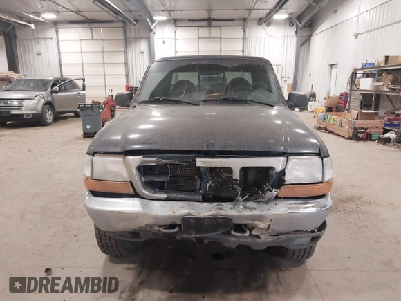 2000 Ford Ranger XLT with VIN 1FTZR15X2YPB86720, listed as a IAAI auction lot 41501141 with 211,794 mi miles. Bid and sale history available at carsss.com. Image 12.
