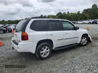 2005 GMC Envoy SLT with VIN 1GKDS13S652330496, listed as a Copart auction lot 73317234 with 191,138 mi miles and Salvage Title. Bid and sale history available at carsss.com. Image 3.