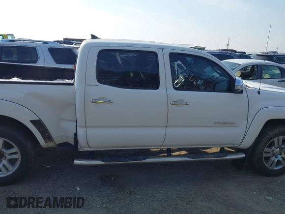 2015 Toyota Tacoma with VIN 3TMMU4FN5FM073323, listed as a IAAI auction lot 41800476 with 132,250 mi miles and . Bid and sale history available at DreamBid. Image 12.