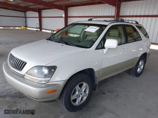 1999 Lexus RX 300 Luxury SUV with VIN JT6HF10UXX0020400, listed as a IAAI auction lot 41866556 with 237,899 mi miles. Bid and sale history available at carsss.com. Image 2.