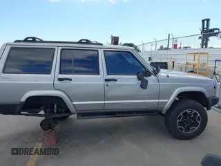 2000 Jeep Cherokee z VIN 1J4FF48S1YL200458, wystawiony jako IAAI lot #42239282 z przebiegiem Nie podano mil oraz . Historia ofert i sprzedaży dostępna na DreamBid. Obrazek 13.