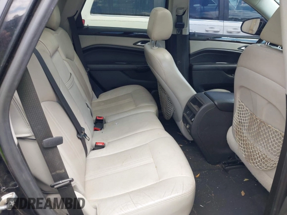 2013 Cadillac SRX Performance Collection z VIN 3GYFNDE35DS555248, wystawiony jako IAAI lot #42001494 z przebiegiem 268 410 mil mil oraz . Historia ofert i sprzedaży dostępna na DreamBid. Obrazek 8.