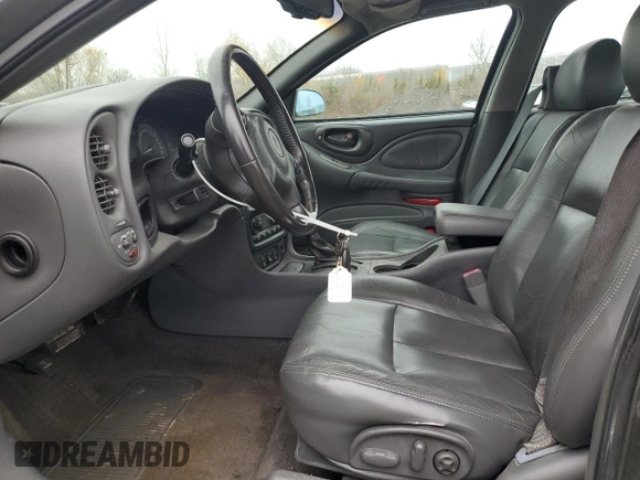 2004 Pontiac Bonneville SLE z VIN 1G2HY52K24U164098, wystawiony jako Copart lot #82283344 z przebiegiem 132 456 mil mil oraz Szkoda całkowita • Salvage title. Historia ofert i sprzedaży dostępna na DreamBid. Obrazek 7.