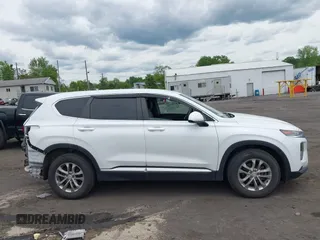 2019 Hyundai Santa Fe SE z VIN 5NMS2CADXKH005960, wystawiony jako IAAI lot #42341142 z przebiegiem 71 617 mil mil oraz . Historia ofert i sprzedaży dostępna na DreamBid. Obrazek 13.