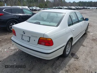 1998 BMW 5 Series 528iA with VIN WBADD6329WBW45360, listed as a IAAI auction lot 41872166 with 110,393 mi miles. Bid and sale history available at carsss.com. Image 4.