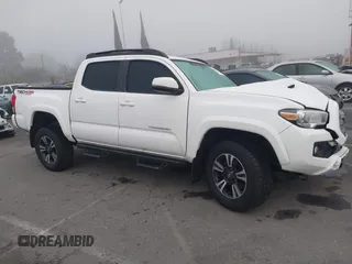 2016 Toyota Tacoma SR with VIN 3TMCZ5AN0GM030469, listed as a IAAI auction lot 41665255 with 178,591 mi miles and . Bid and sale history available at carsss.com. Image 13.