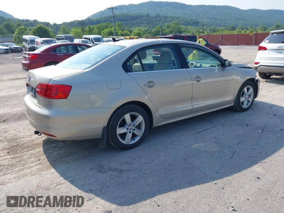 2014 Volkswagen Jetta TDI w/Premium with VIN 3VW3L7AJ3EM319365, listed as a IAAI auction lot 42479875 with 133,068 mi miles and . Bid and sale history available at DreamBid. Image 4.