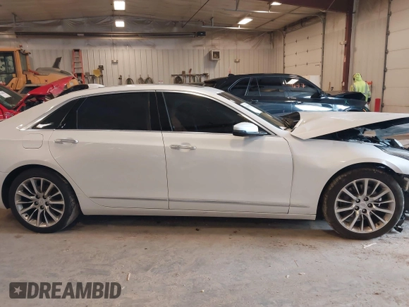 2017 Cadillac CT6 Luxury AWD z VIN 1G6KD5RS9HU203376, wystawiony jako IAAI lot #42181002 z przebiegiem Nie podano mil oraz . Historia ofert i sprzedaży dostępna na DreamBid. Obrazek 13.