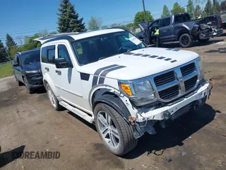 2011 Dodge Nitro Shock z VIN 1D4PU7GX0BW527179, wystawiony jako IAAI lot #42238108 z przebiegiem 134 743 mil mil oraz . Historia ofert i sprzedaży dostępna na DreamBid. Obrazek 1.