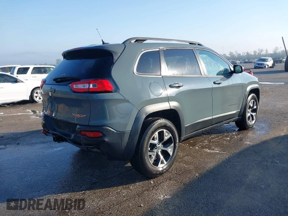 2014 Jeep Cherokee Trailhawk z VIN 1C4PJMBS2EW212341, wystawiony jako IAAI lot #40672694 z przebiegiem 108 622 mil mil oraz . Historia ofert i sprzedaży dostępna na DreamBid. Obrazek 4.
