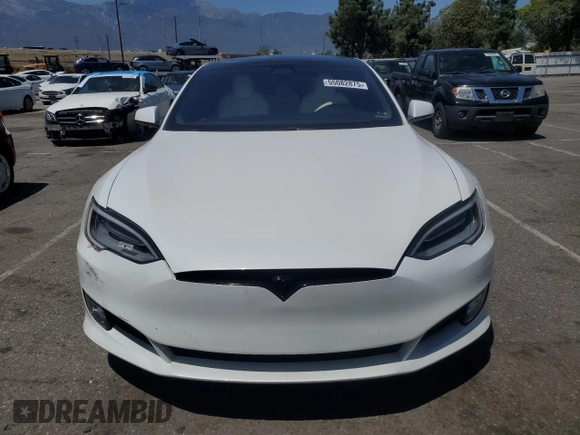 2020 Tesla Model S Performance with VIN 5YJSA1E42LF401157, listed as a Copart auction lot 55082875 with 60,376 mi miles and Salvage title. Bid and sale history available at DreamBid. Image 5.