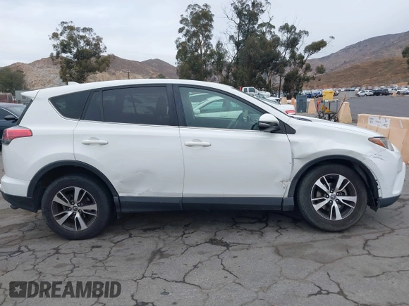 2018 Toyota RAV4 XLE with VIN JTMWFREV7JJ730811, listed as a IAAI auction lot 41075088 with 78,979 mi miles. Bid and sale history available at carsss.com. Image 13.