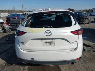2020 Mazda CX-5 Grand Touring with VIN JM3KFBDM6L0751471, listed as a IAAI auction lot 41914849 with Not Provided miles and . Bid and sale history available at carsss.com. Image 16.