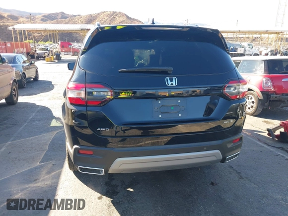 2023 Honda Pilot Elite with VIN 5FNYG1H8XPB018788, listed as a IAAI auction lot 40750753 with 29,565 mi miles. Bid and sale history available at carsss.com. Image 16.
