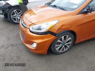 2015 Hyundai Accent Sport with VIN KMHCU5AE3FU205849, listed as a IAAI auction lot 41827093 with 112,980 mi miles. Bid and sale history available at carsss.com. Image 6.