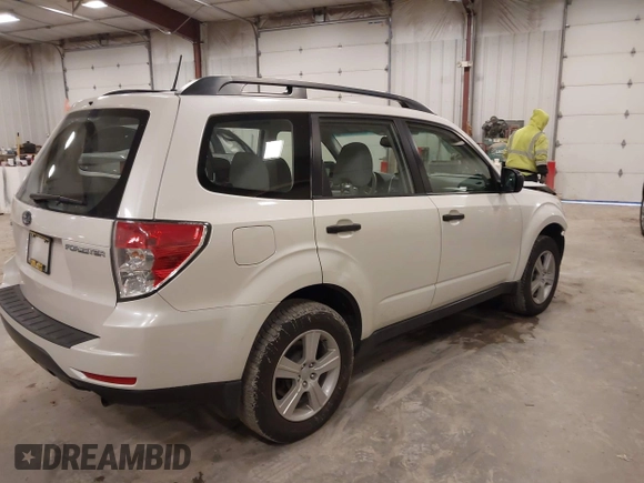 2012 Subaru Forester X with VIN JF2SHBBCXCH433191, listed as a IAAI auction lot 41964271 with 146,176 mi miles and . Bid and sale history available at DreamBid. Image 4.