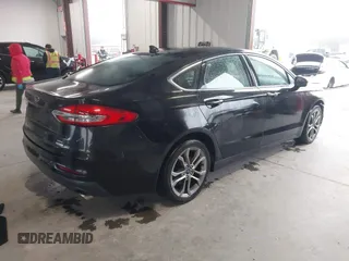 2019 Ford Fusion SEL with VIN 3FA6P0CD2KR260770, listed as a IAAI auction lot 41564261 with 108,818 mi miles and . Bid and sale history available at DreamBid. Image 4.