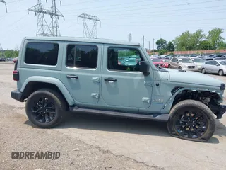 2023 Jeep Wrangler Sahara with VIN 1C4JJXP6XPW554741, listed as a IAAI auction lot 42380681 with 15,148 mi miles and . Bid and sale history available at DreamBid. Image 14.