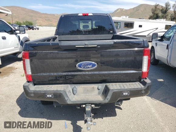 2019 Ford F-350 XL with VIN 1FT8W3BT0KED37509, listed as a Copart auction lot 60283655 with 122,571 mi miles and Salvage title. Bid and sale history available at DreamBid. Image 6.