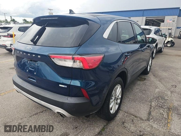 2020 Ford Escape SE with VIN 1FMCU9G6XLUB25614, listed as a IAAI auction lot 42730667 with 66,018 mi miles and . Bid and sale history available at DreamBid. Image 16.