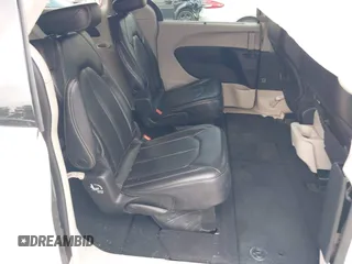 2023 Chrysler Pacifica Touring L with VIN 2C4RC1BG8PR535446, listed as a IAAI auction lot 42307923 with 65,718 mi miles and . Bid and sale history available at DreamBid. Image 8.