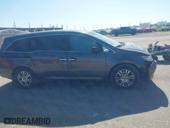 2012 Honda Odyssey EX-L with VIN 5FNRL5H61CB095789, listed as a IAAI auction lot 42065507 with 138,570 mi miles and . Bid and sale history available at DreamBid. Image 13.